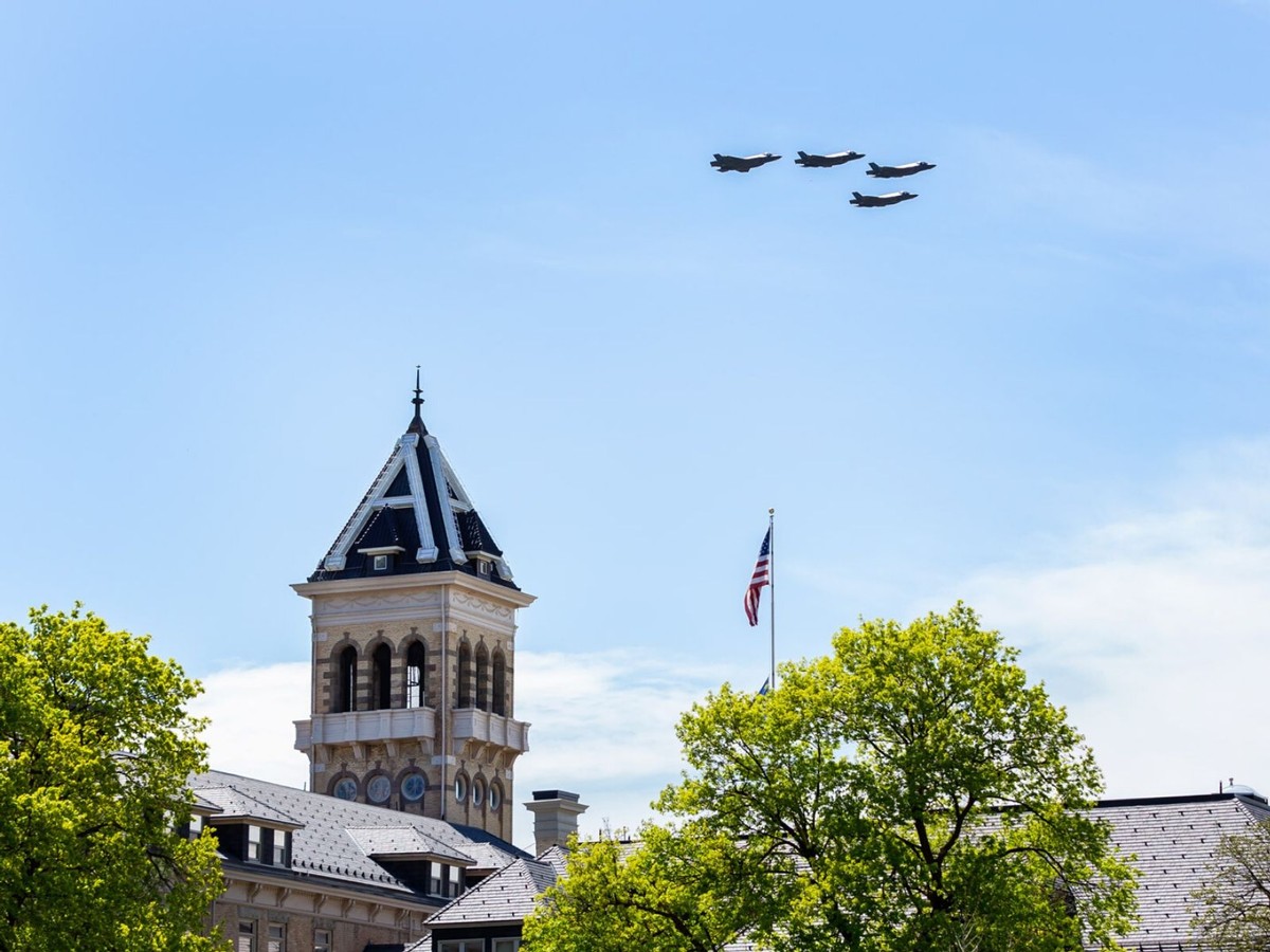 Four F-35 fighter jets fly past Old Main
